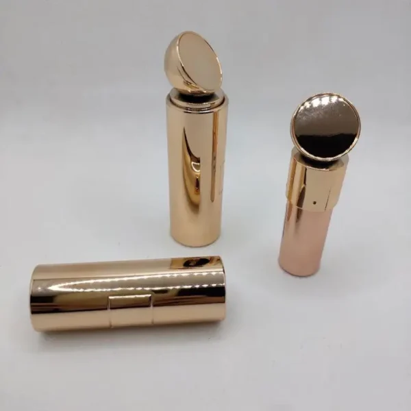 shiny rose gold lipstick tube empty with mirror